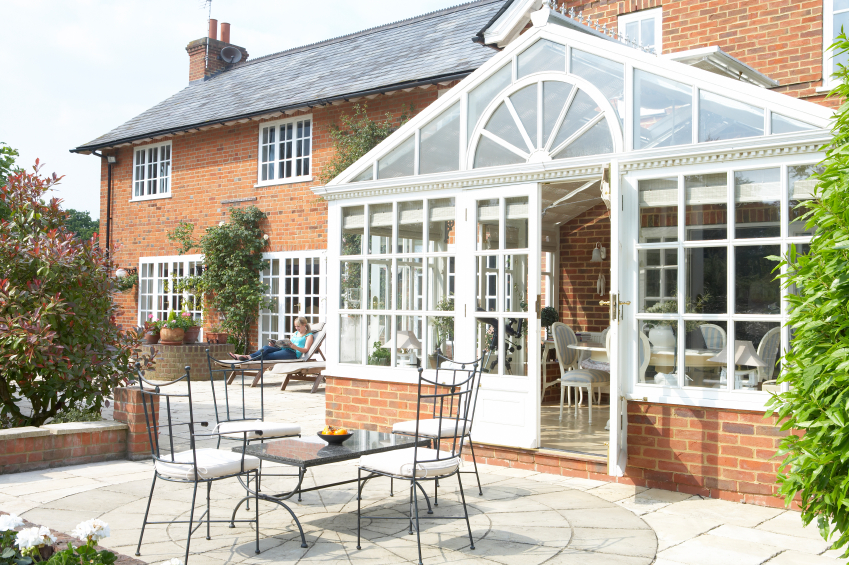 Exterior Of House With Conservatory And Patio conservatory