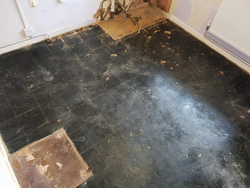 Removal of asbestos floor tiles