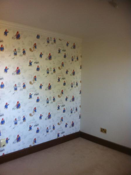 Baby room feature wallpapering
